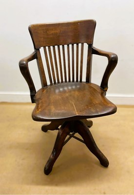 Lot 810 - A 19th century oak Captain's style style...