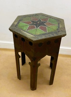 Lot 786 - A hexagonal painted wood surprise table with...