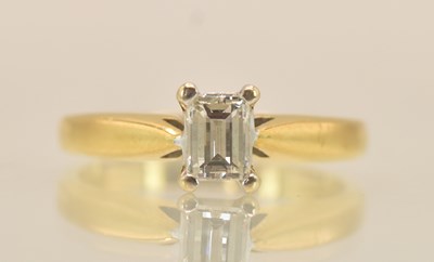 Lot 1333 - An 18ct yellow gold diamond solitaire ring,...