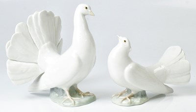 Lot 122 - LLADRÓ; two doves, height of largest 20cm (2).