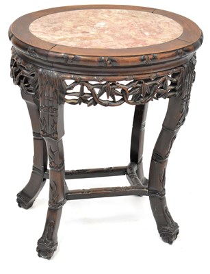 Lot 52 - A Chinese rosewood oval marble-topped...