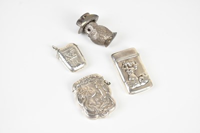 Lot 320 - Four silver vesta cases, including one...