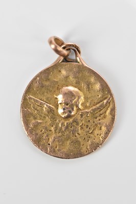Lot 414 - A gold-plated circular pendant set with an...
