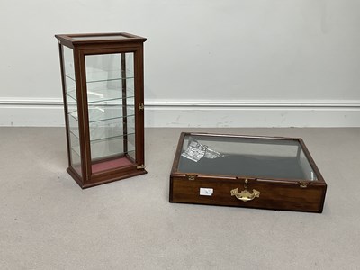 Lot 1190 - Two tabletop display cabinets, height of...