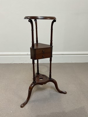 Lot 1138 - A 19th century mahogany two drawer washstand,...