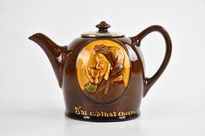 Lot 1466 - ROYAL DOULTON; a stoneware teapot, ‘The Cup...