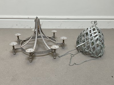 Lot 1336 - A modern wrought iron seven light pricket...