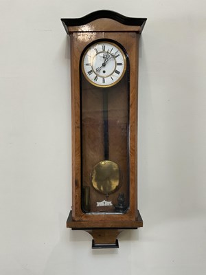 Lot 1184 - A walnut cased Vienna style wall clock, with...
