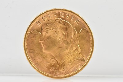 Lot 548 - A Helvetia Swiss 20 franc gold coin dated 1949,...