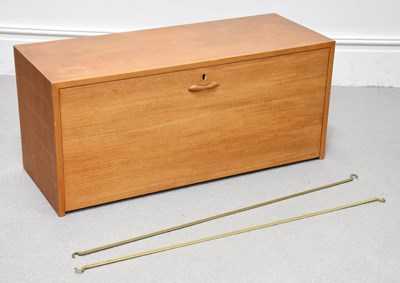 Lot 52 - STAPLES; a mid-century teak cabinet from a...