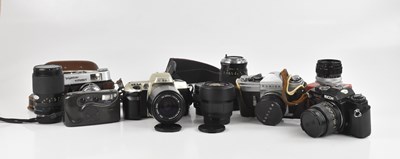 Lot 632 - A collection of cameras and lenses, to include...