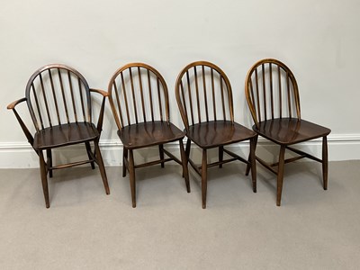 Lot 1016 - ERCOL; four stained beech dining chairs,...