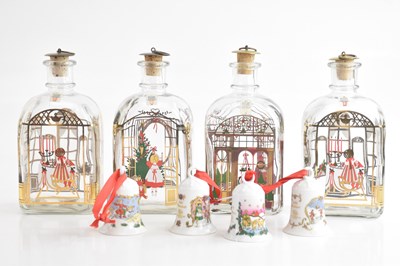 Lot 1600 - HOLMEGAARD: four Christmas decanters, height...