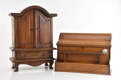 Lot 1203 - A modern Continental carved wood apprentice...