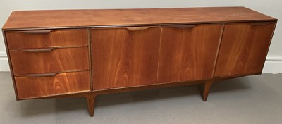 Lot 1000 - A mid 20th century teak sideboard, with three...