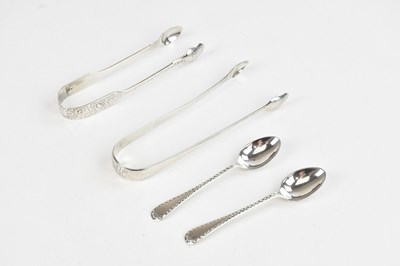 Lot 296 - A pair of George III hallmarked silver sugar...