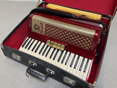 Lot 1615 - SCANDALLI; a cased piano accordion.