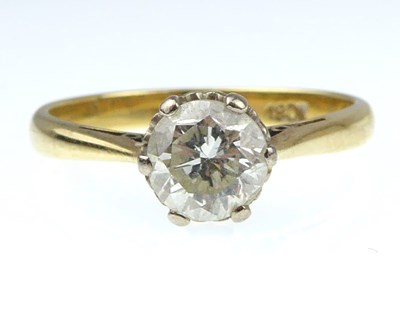 Lot 937 - An 18ct yellow gold diamond solitaire ring,...