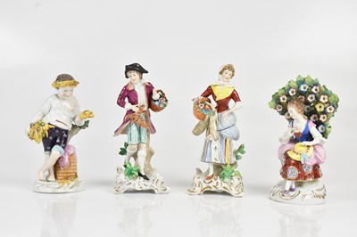 Lot 1425 - SITZENDORF; a pair of German porcelain figures...