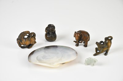 Lot 1378 - Four Japanese carved wooden netsukes, length...