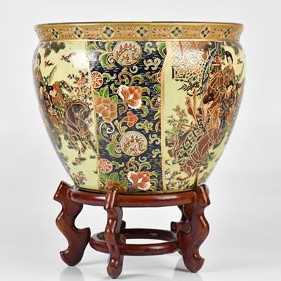Lot 1377 - A modern Chinese fish bowl on wooden stand,...