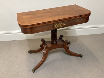 Lot 1081 - A Regency brass inlaid mahogany tea table,...