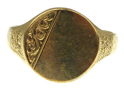 Lot 965 - A 9ct gold signet ring with an oval table and...