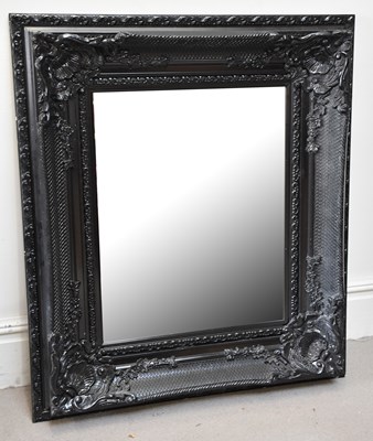 Lot 1009 - A decorative mirror 106 x 91cm