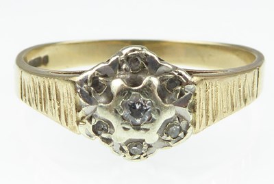 Lot 955 - A 9ct gold illusion set tiny diamond ring with...