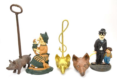 Lot 350 - A collection of doorstops including two fox...