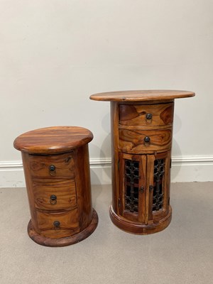 Lot 114 - A modern teak cylindrical cabinet, with metal...