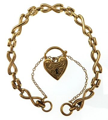Lot 981 - A 9ct gold fancy link bracelet with safety...