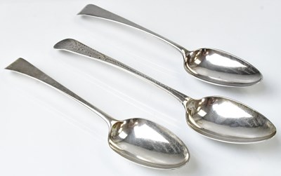 Lot 578 - Three Georgian hallmarked silver table spoons,...