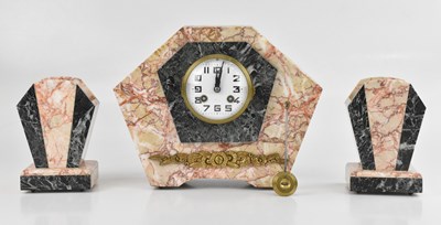 Lot 1177 - An Art Deco rouge marble mantel clock...