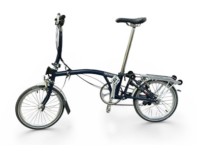 Lot 316 - BROMPTON; a modern cased folding M6L 6 speed...