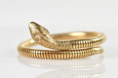Lot 86 - A 9ct yellow gold serpent bracelet, with...