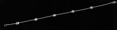 Lot 110 - A white metal and diamond set fine link...