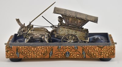 Lot 1057 - An Indonesian silver model of two oxen pulling...
