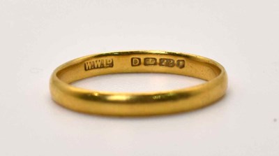Lot 597 - A 22ct gold wedding band, size J, 1.4g.