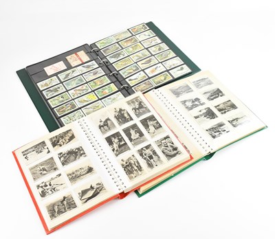 Lot 1663 - Three albums of assorted cigarette and tea...