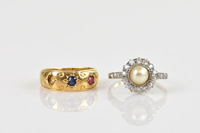 Lot 569 - An 18ct yellow gold dress ring set with one...