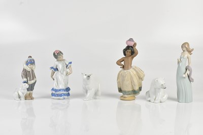 Lot 1418 - LLADRO; six figures comprising a maiden in a...