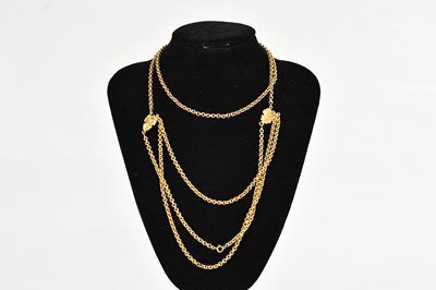Lot 289 - A large yellow metal three strand belcher type...