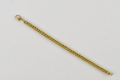 Lot 77 - A yellow metal curb link bracelet, tests as 18....