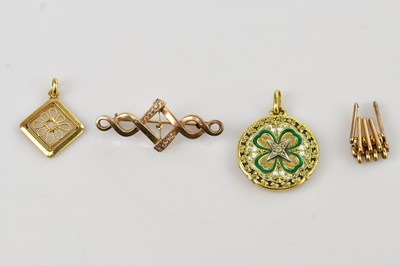 Lot 163 - A yellow metal openwork pendant, tests as 18kt...
