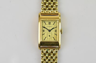 Lot 1015 - LONGINES; a gentleman's 18ct gold cased...
