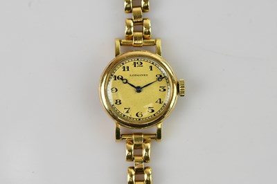 Lot 1028 - LONGINES; a lady's 18ct gold cased wristwatch,...