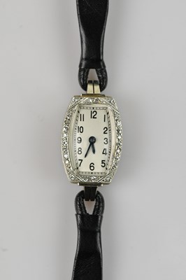 Lot 1066 - An 18ct white gold diamond set cocktail watch,...
