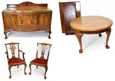 Lot 1571 - An early 20th century mahogany dining suite