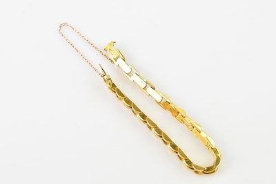Lot 68 - A yellow metal flat link bracelet, tests as 17....